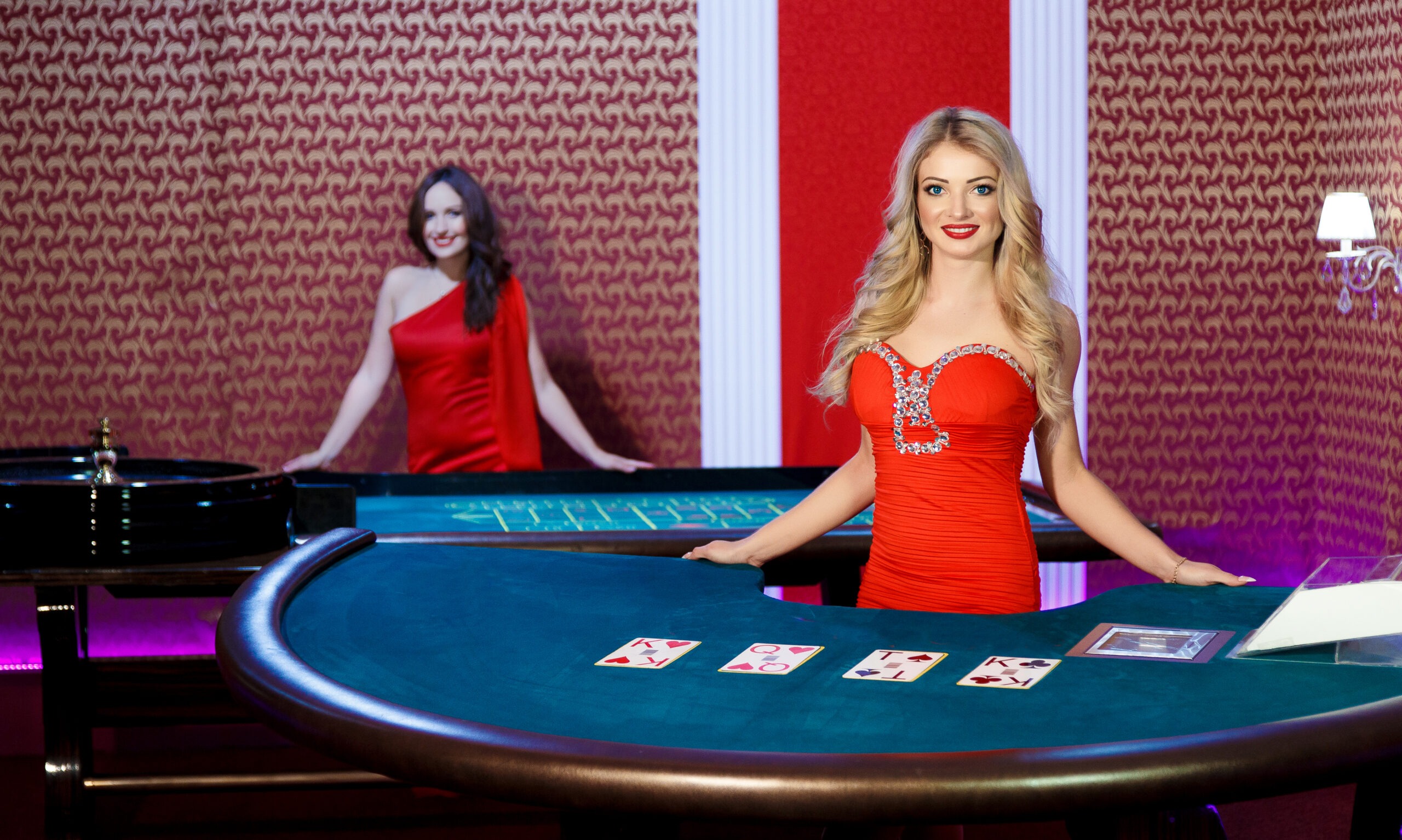 Dealer in the Casino at the Poker Table.